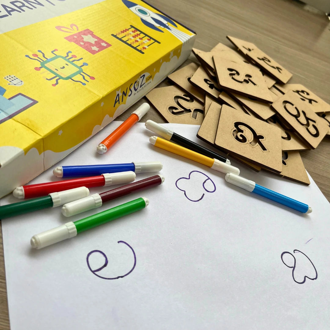Traced Telugu consonants on paper with wooden alphabet toy