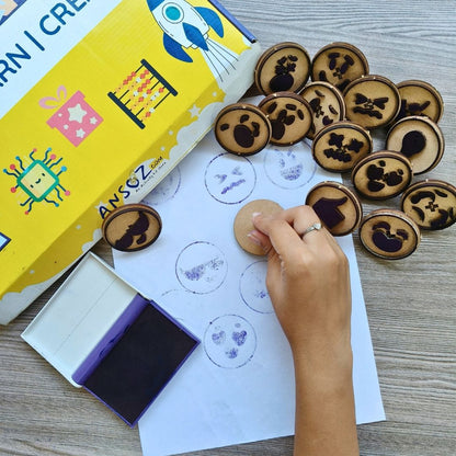 Emoji stamps for kids with cute emoji faces, stamp pad and activity sheet.
