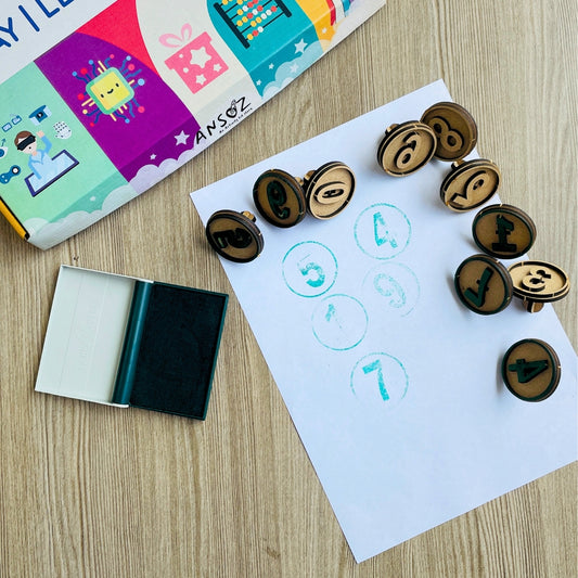 Number stamps placed around paper with printed numbers and ink pad 