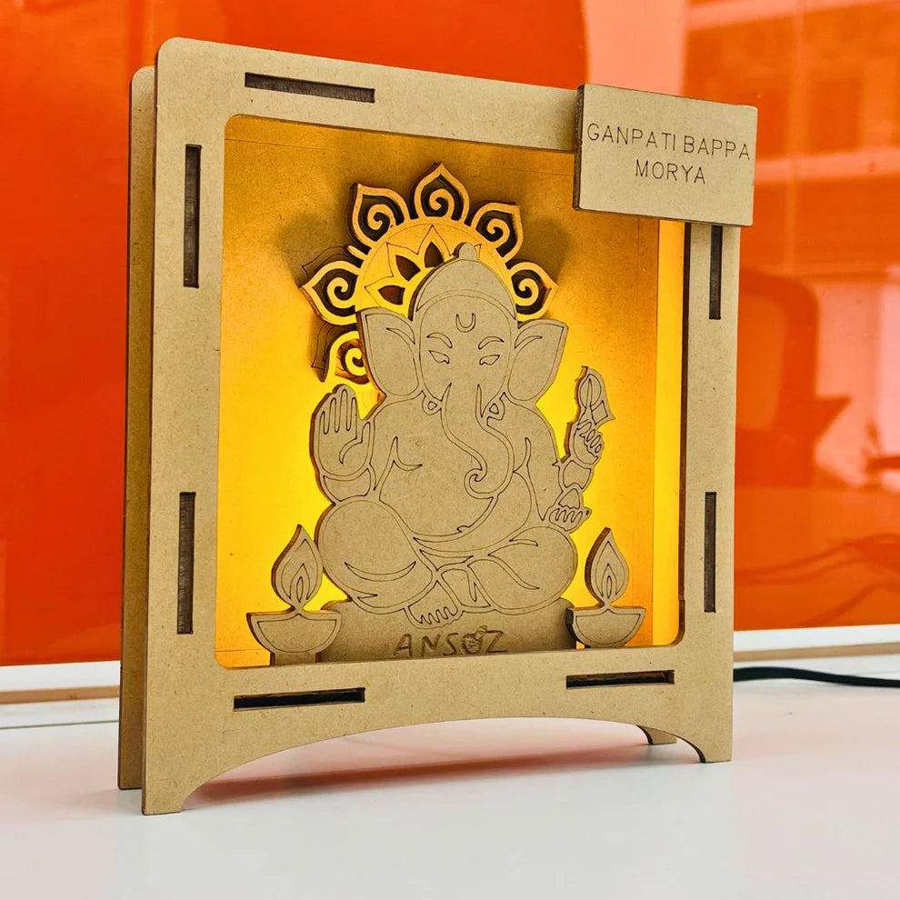 Wooden DIY Ganesha kit with LED light, a festival craft idea for Ganesh Chaturthi and Diwali decor.