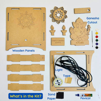 Contents of an eco-friendly Ganesha kit including wooden craft items, LED light, paints and fevicol for an easy craft activity