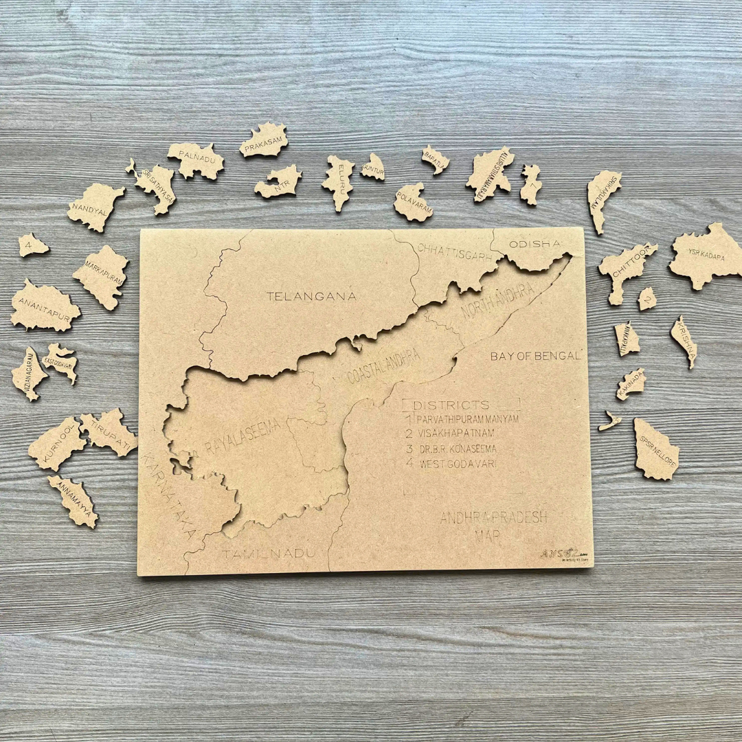 District pieces scattered around a wooden Andhra Pradesh map puzzle.