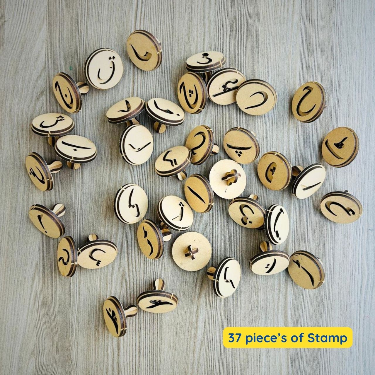 A complete Urdu alphabet wood stamp set for learning Urdu letters.

