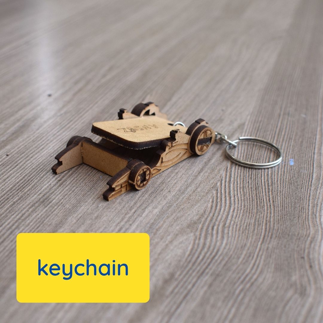  Formula race car shaped DIY keychain kit made from laser-cut wood, compact foldable design that transforms into a mobile stand.