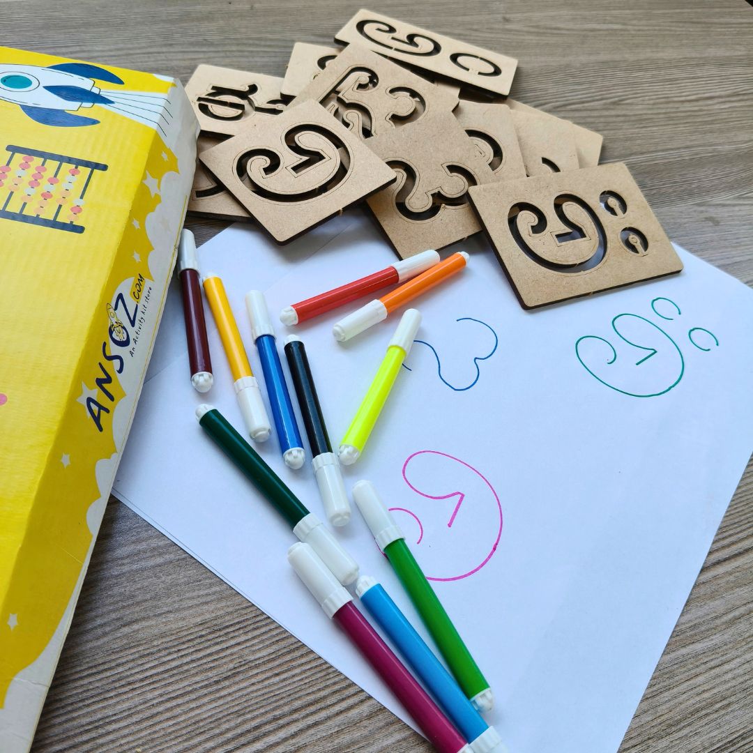 Kannada swaragalu stencil kit with colourful markers for interactive letter formation.