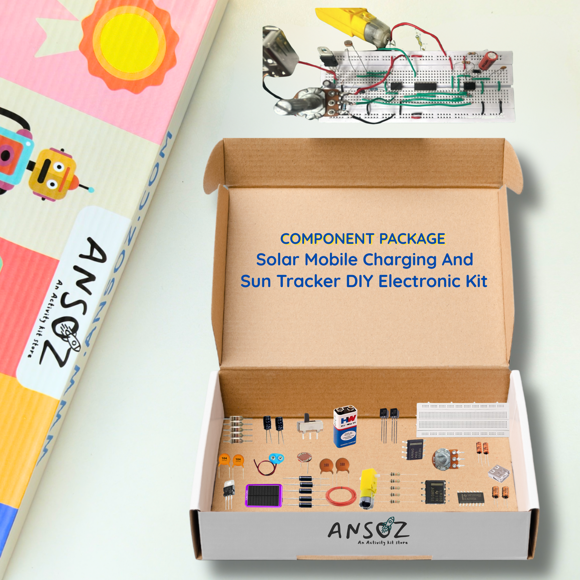 Open box of DIY electronics kit showing components for solar mobile charging and sun tracker science project
