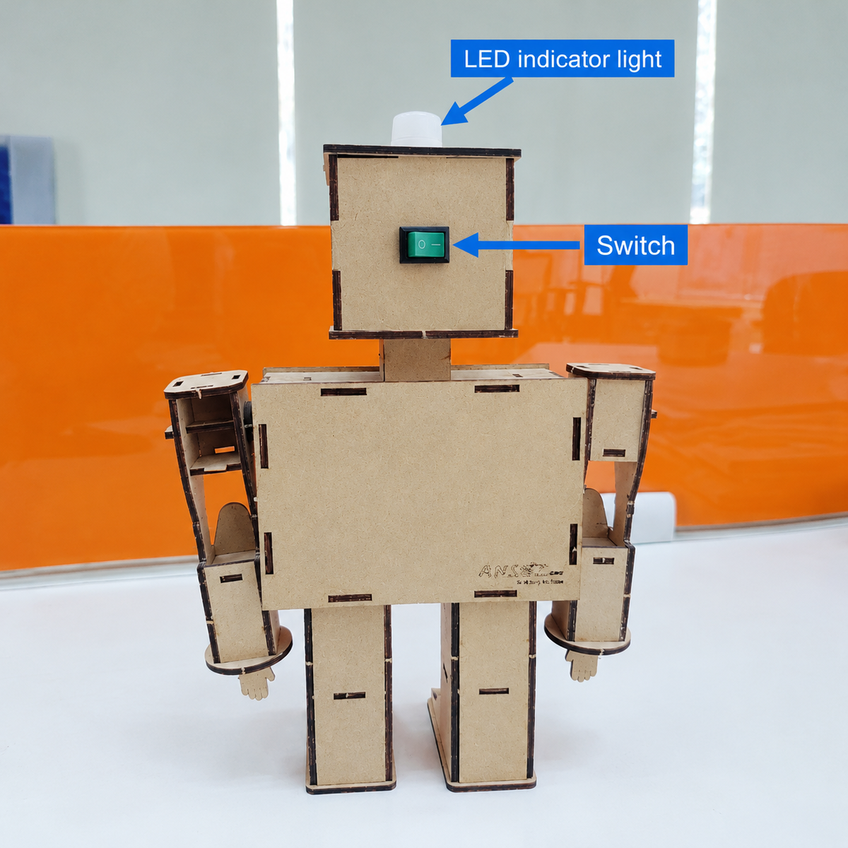 ANSOZ DIY Wooden Light Beam Control Robot Kit featuring an LED indicator light and power switch.
