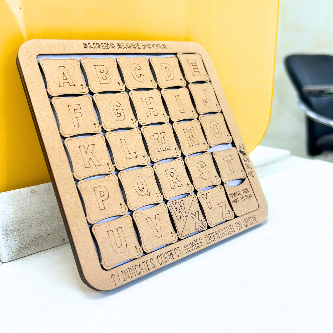 Wooden alphabet puzzle brain teaser game for children. 
