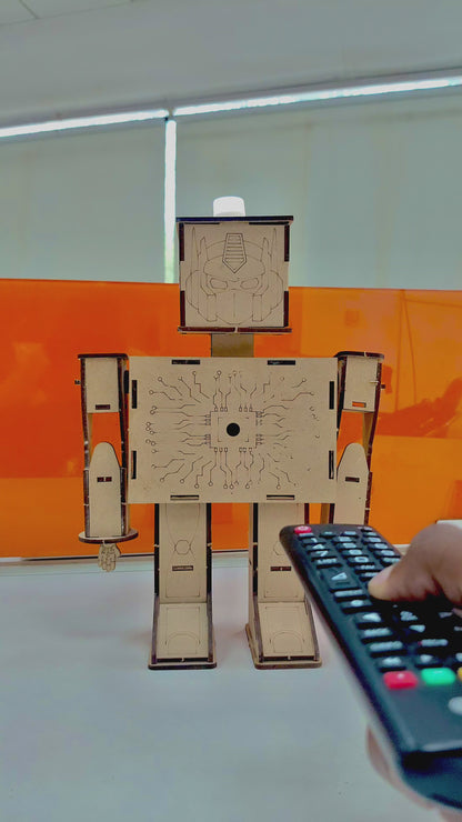 ANSOZ DIY Wooden Light Beam Control Robot Kit demonstrating on and off functionality using a TV remote.